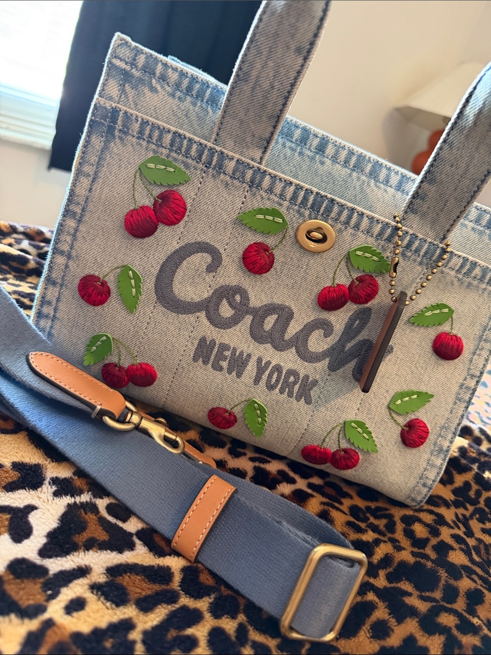 Coach Denim Cherry-Embroidered Tote with Blue Strap and Tan Trim